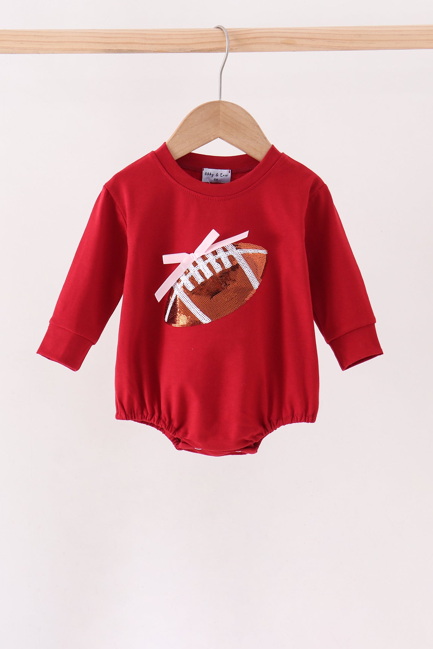 Maroon football bow sequin bubble